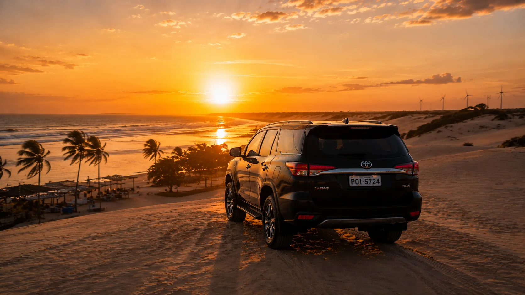 Veículo 4x4 em dunas no trajeto via praia para Jericoacoara